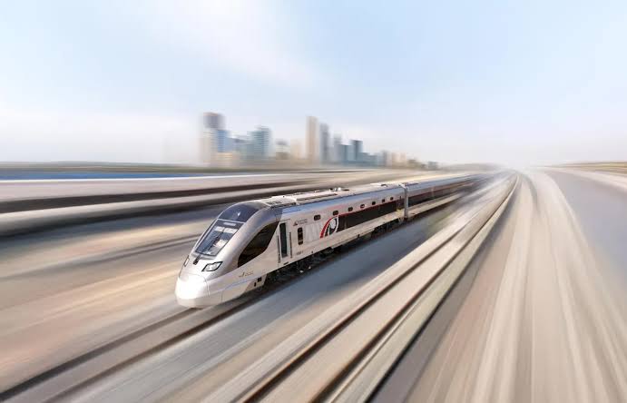 Etihad Rail passenger train standing at a passenger station in the United Arab Emirates