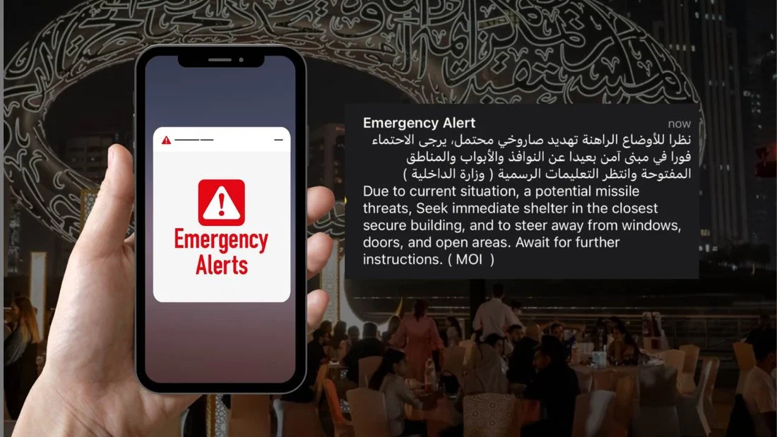 Smartphone displaying a severe flash-flood emergency alert as an illustration of mobile public warnings